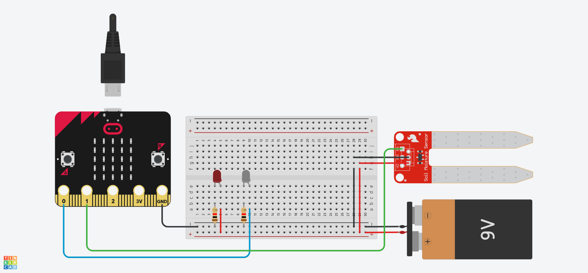 The Tinkercad Circuit now has ires connecting the negative rail to f28, the positive rail to f29, h28 to the ground terminal on a soil mositure sensor, g29 to the power terminal of the soil moisture sensor, and the control terminal of the soil moisture sensor to Pin 1 on the Micro:Bit.