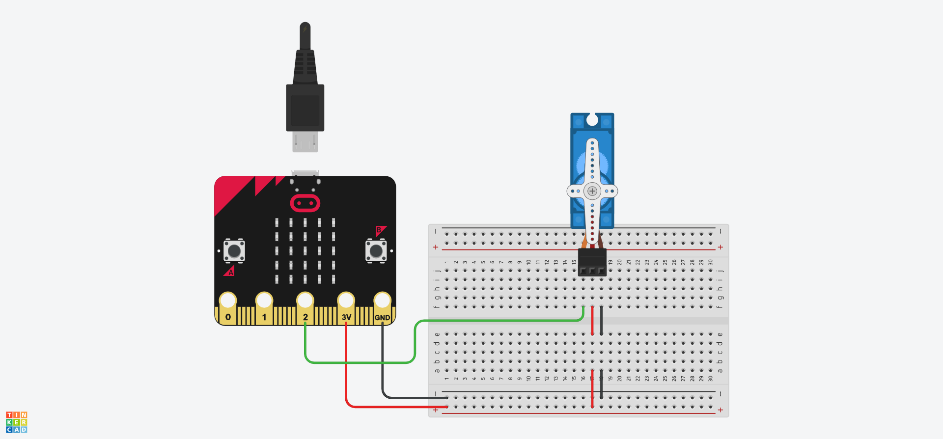 A Tinkercad circuit showing a Micro:Bit connected to a breadboard to provide power. A servo is attached to holes j16, j17, and j18. hole f16 has a wire connecting it directly to pin 2 of the Micro:Bit. Wires also connect the positive wire to f17 and the negative rail to f18.