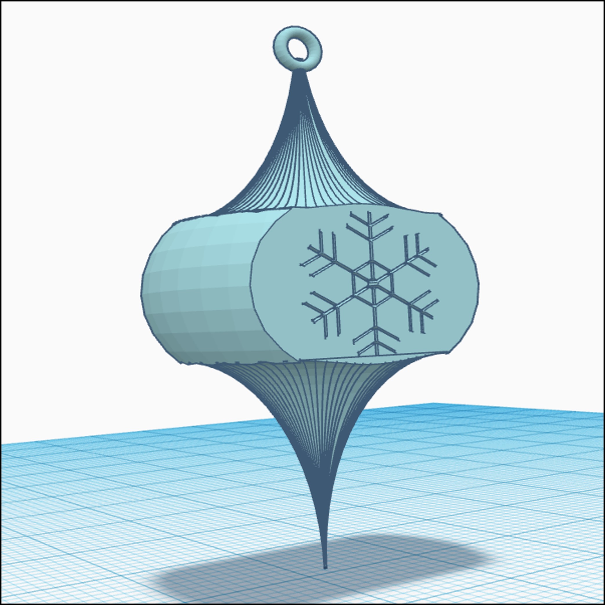 An elongated bauble design with snowflake patterning